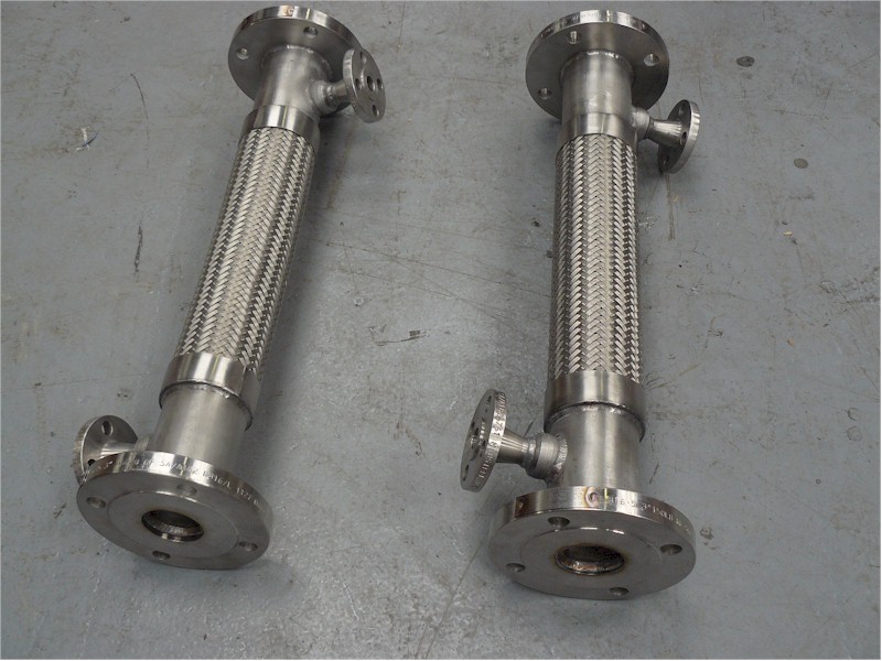 Metal hose assembly jacketed